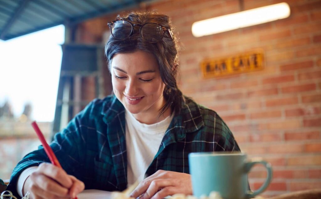 Woman expressing emotions in a recovery letter.