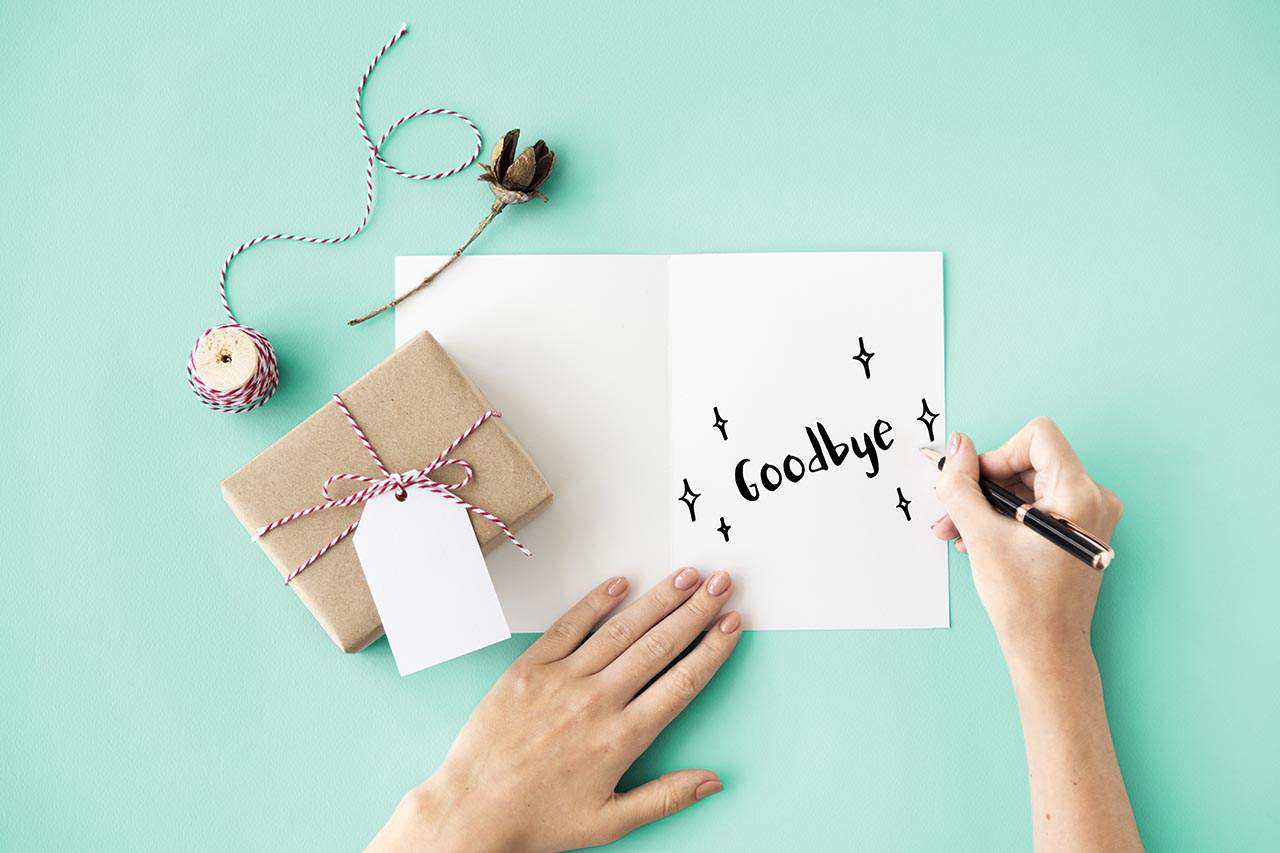 A person writes a goodbye addiction letter.