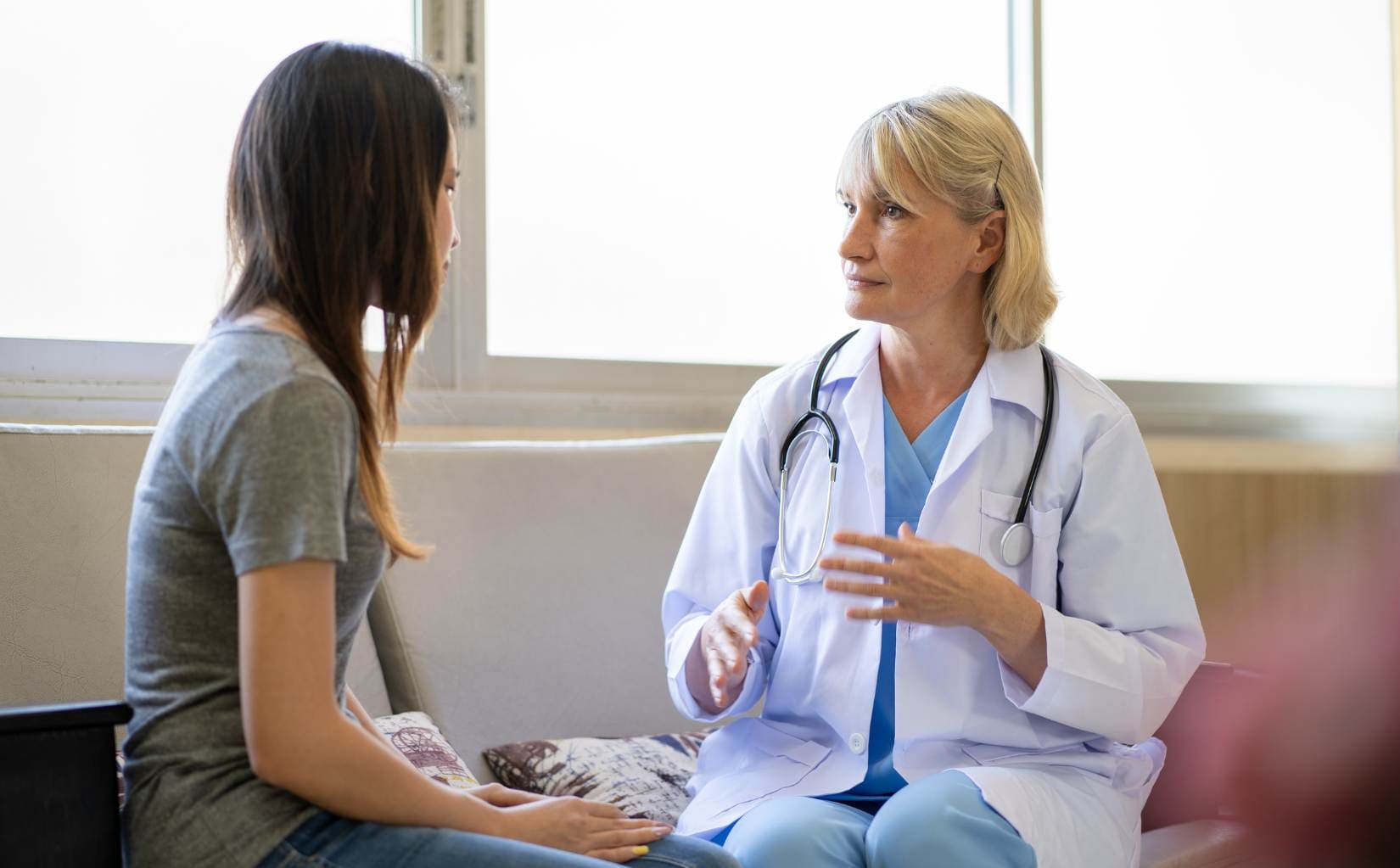 Doctor discussing compulsion vs addiction with patient.