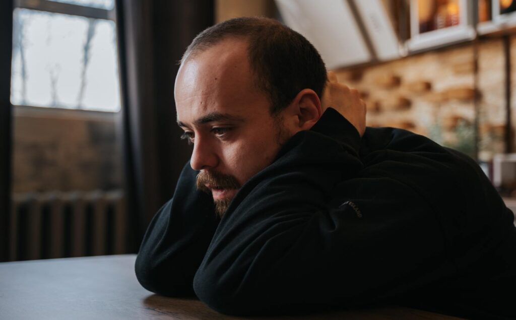 Man experiencing addictive urges and compulsions.