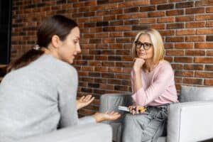 A woman discusses C-PTSD with her therapist.