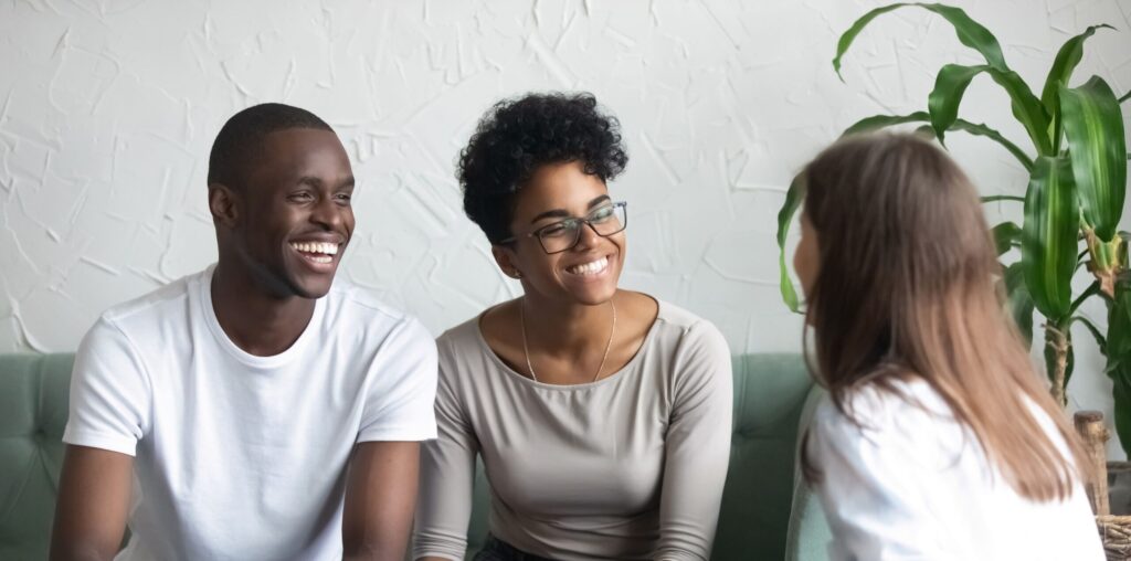 A therapist talks with a couple during family counseling in Pompano Beach, Florida.