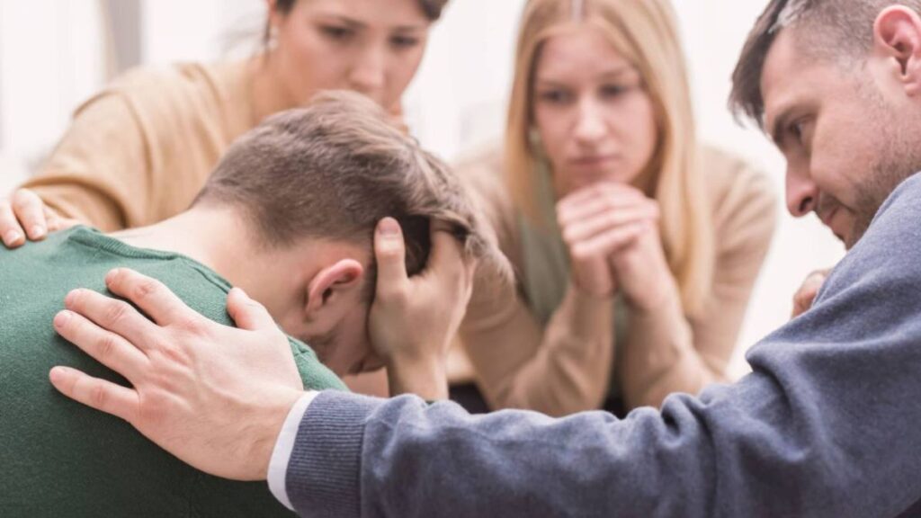 A family supporting and encouraging their loved one to start heroin detox in Pompano Beach, FL.