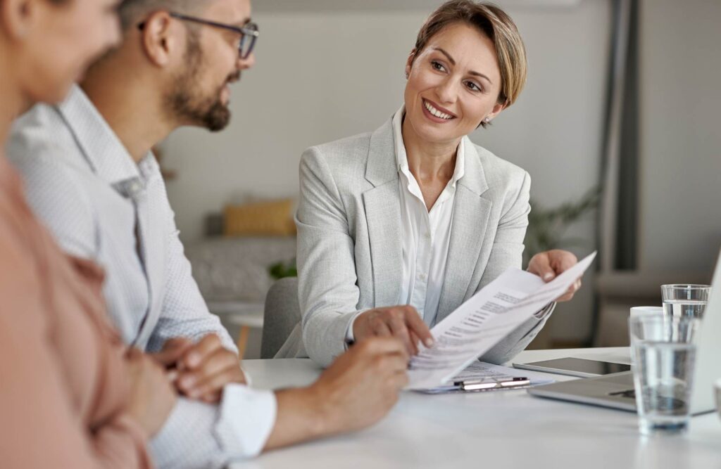 Specialist reviewing benefits of PHCS detox coverage with clients.