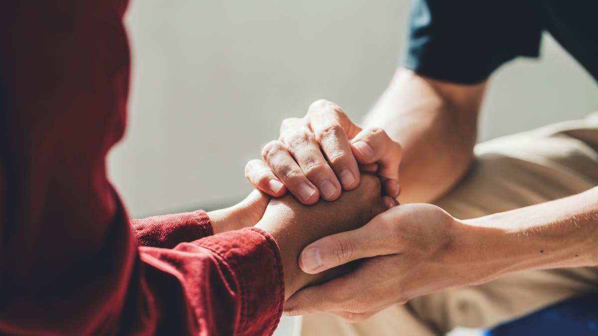 A therapist supporting a client struggling with depression during detox from substances. 