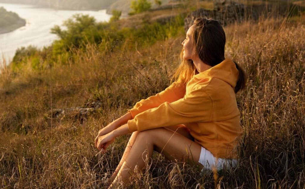 Woman feeling good after addressing signs of benzo addiction.