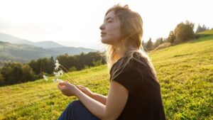 A woman benefits from a mental health retreat covered by insurance.