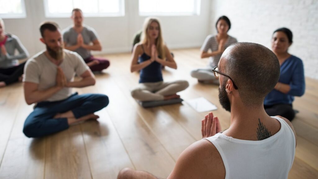 People practicing yoga as part of holistic detox near Palm Beach, Florida.