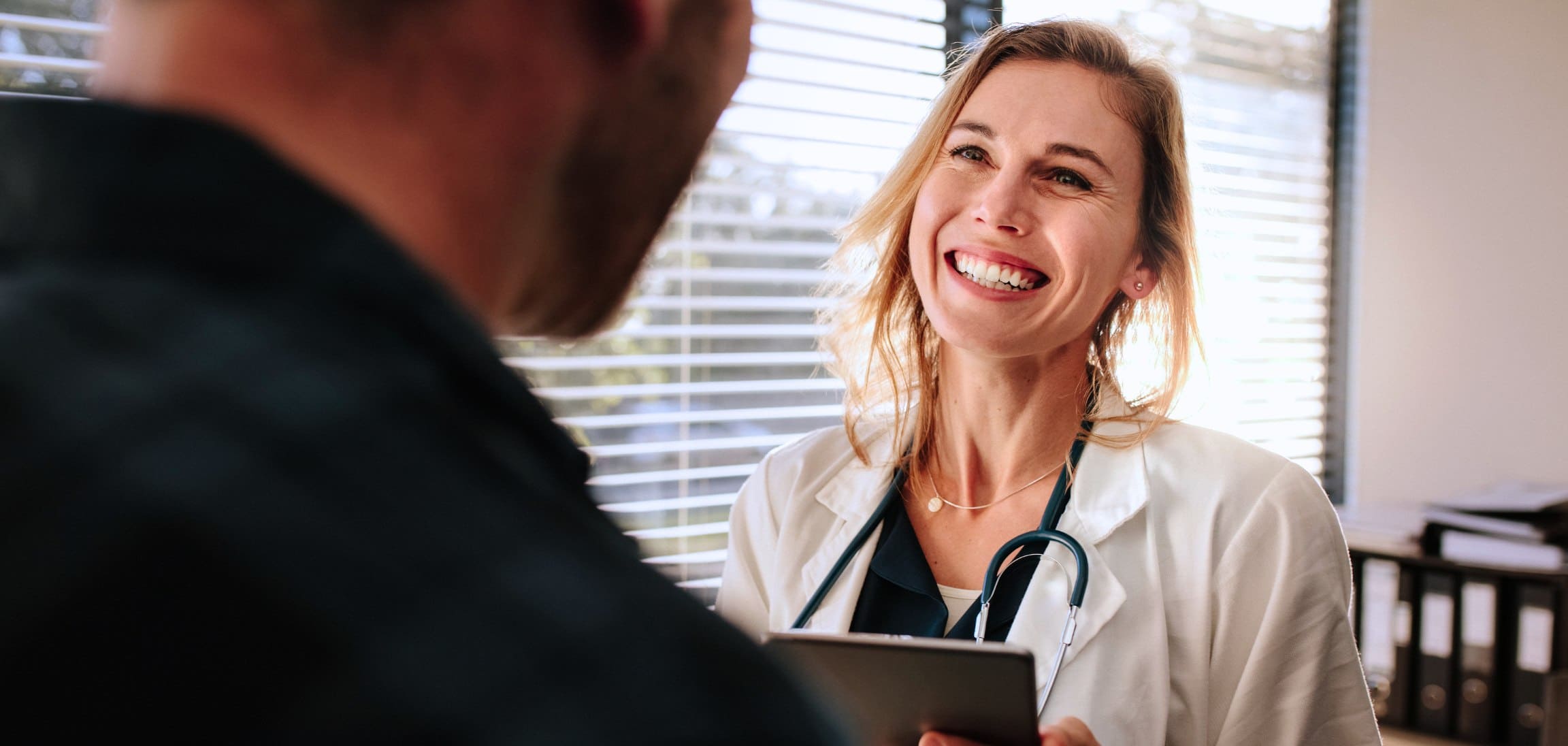 A professional guiding someone through the alcohol withdrawal timeline.