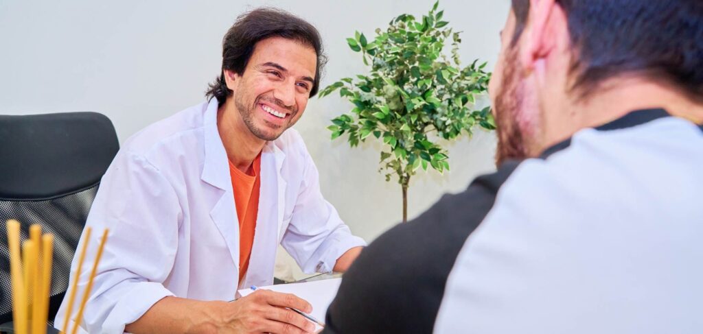 Doctor providing support to a client at our Miami detox center in Florida.