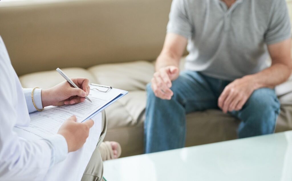 Psychiatrist working with a client during Adderall detox in Pompano Beach, FL.