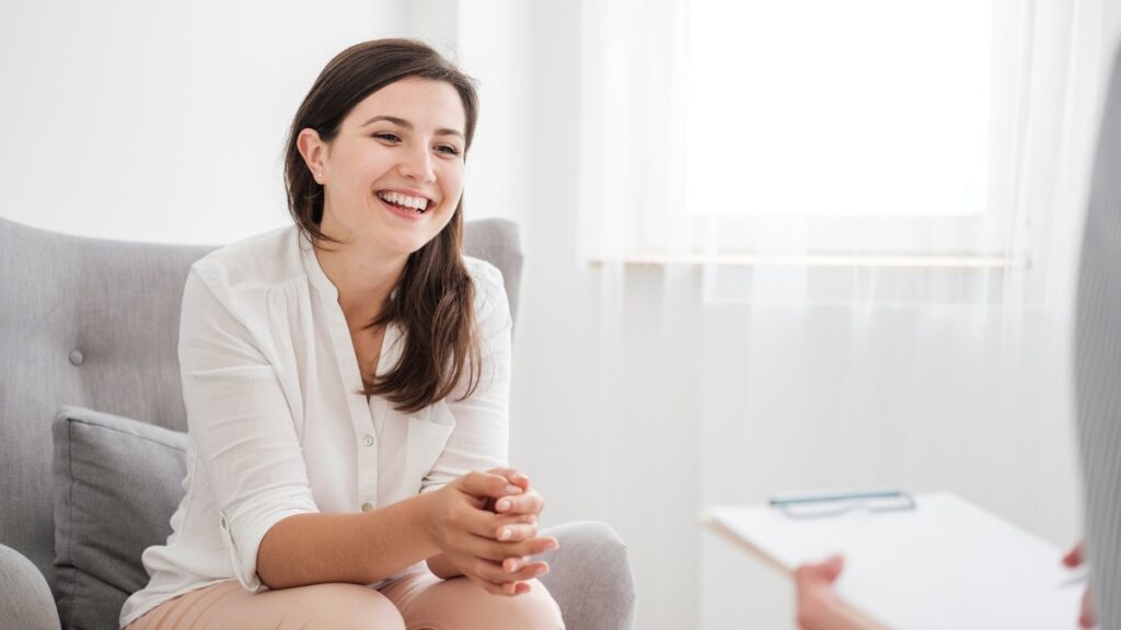 A woman enjoys addiction intervention services in Pompano Beach, FL