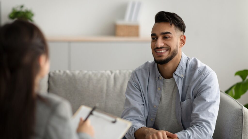 A man enjoys an individual therapy session