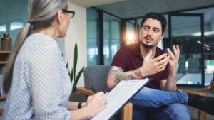 A man asks his therapist how long does cocaine stay in your system while learning healthy recovery methods.