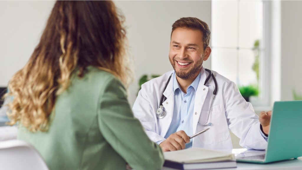 A woman discusses methadone treatment in Pompano Beach, FL with her doctor.