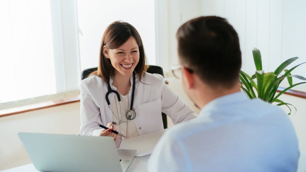 A doctor discusses Suboxone vs Methadone: Differences and Uses in MAT with a client during a MAT consultation.