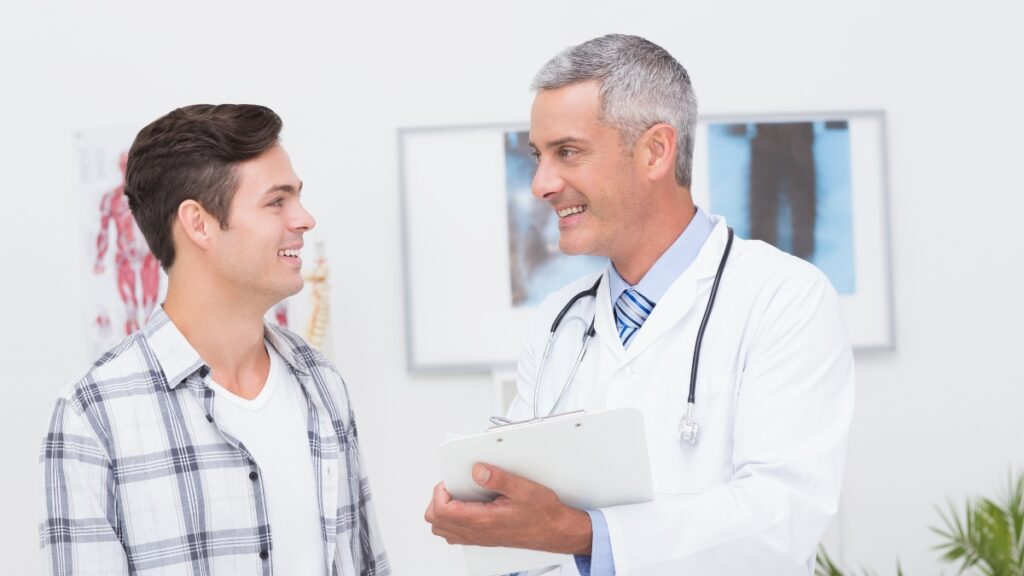 A man enjoys a consultation for medical detox with his doctor