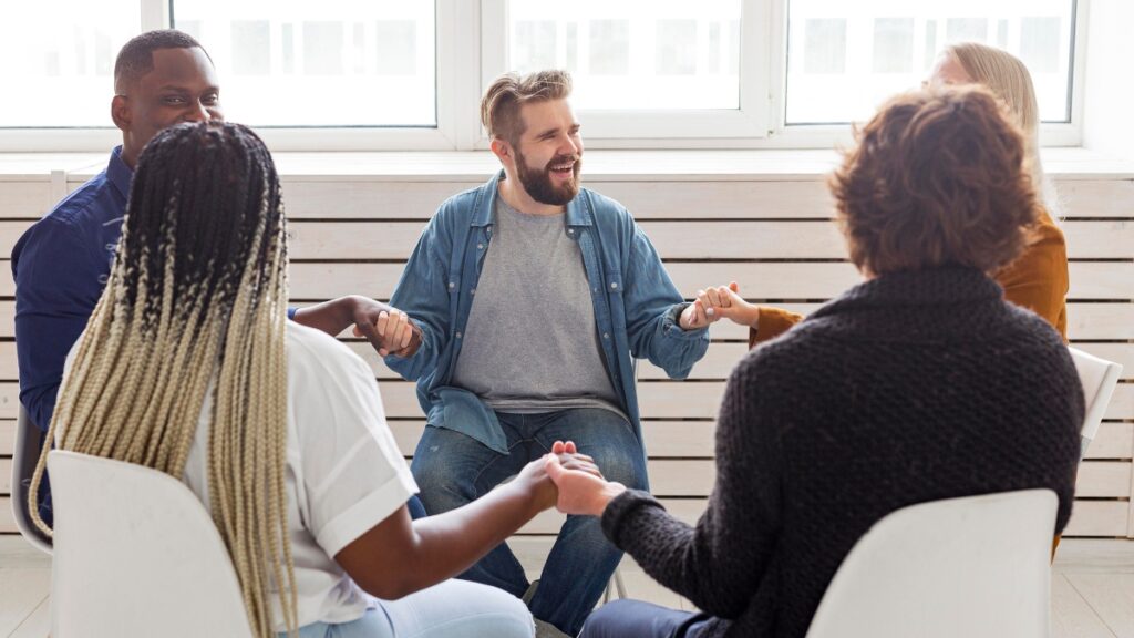 People enjoy a group treatment session after completing the process of detoxing from drugs