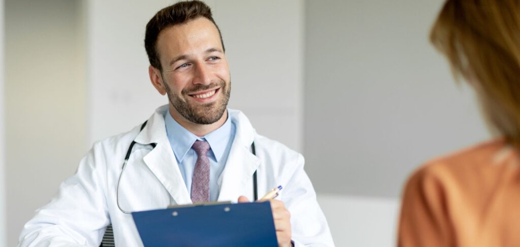 Doctor discussing treatment options with a patient during a medical detox program.