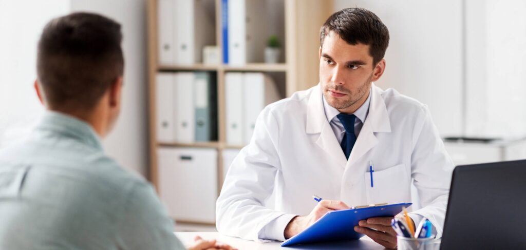 Doctor providing support to a client experiencing drug-induced psychosis.