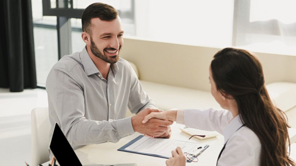 Man meeting with his doctor for psychiatric medication management in Pompano Beach.