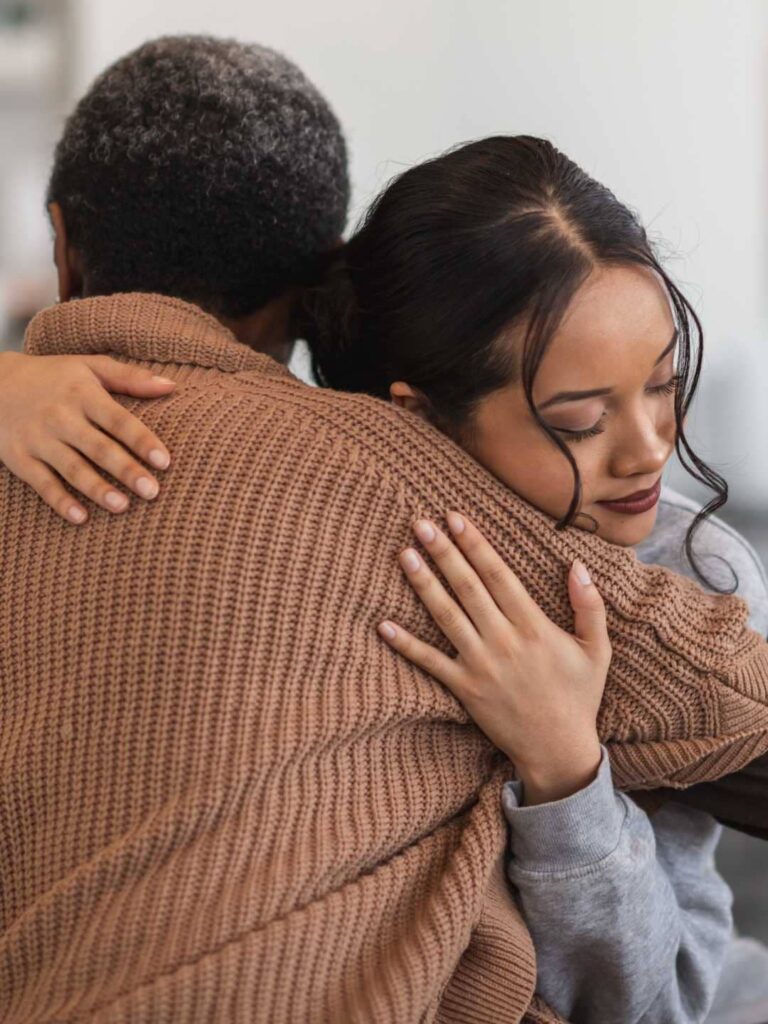 Woman supporting a loved one in addiction recovery at our detox center in Florida.