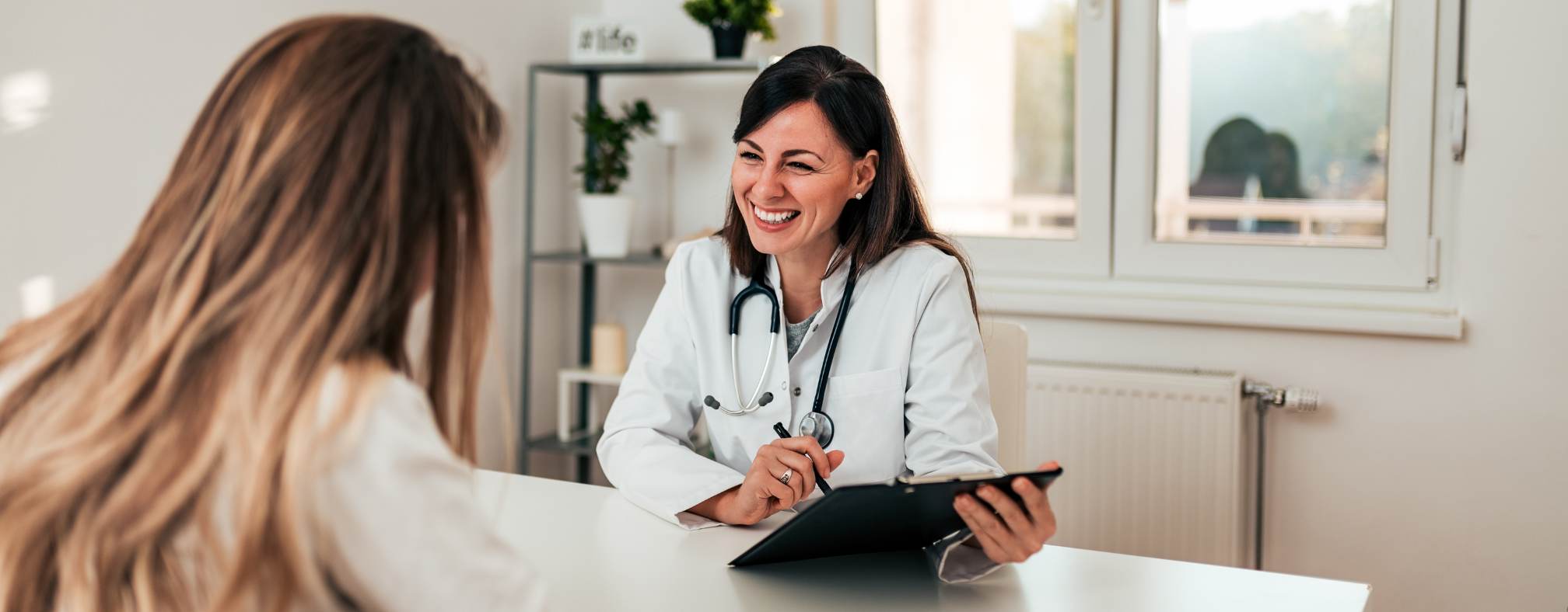 Doctor helping a client through schizophrenia treatment in Pompano Beach, FL.