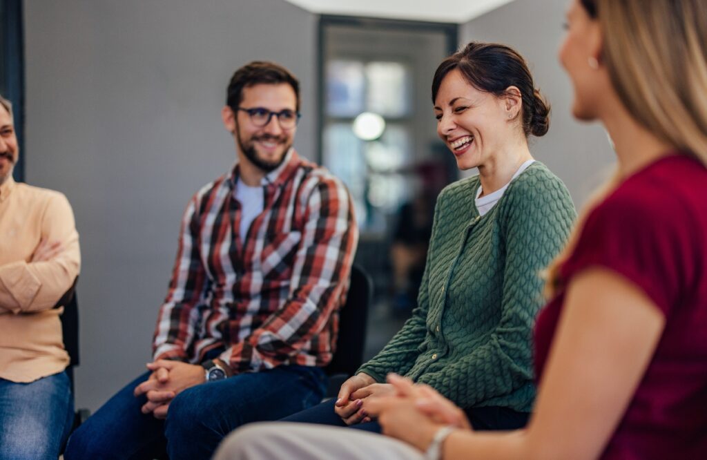 People enjoy a group treatment exercise through schizoaffective disorder treatment in Pompano Beach, FL.