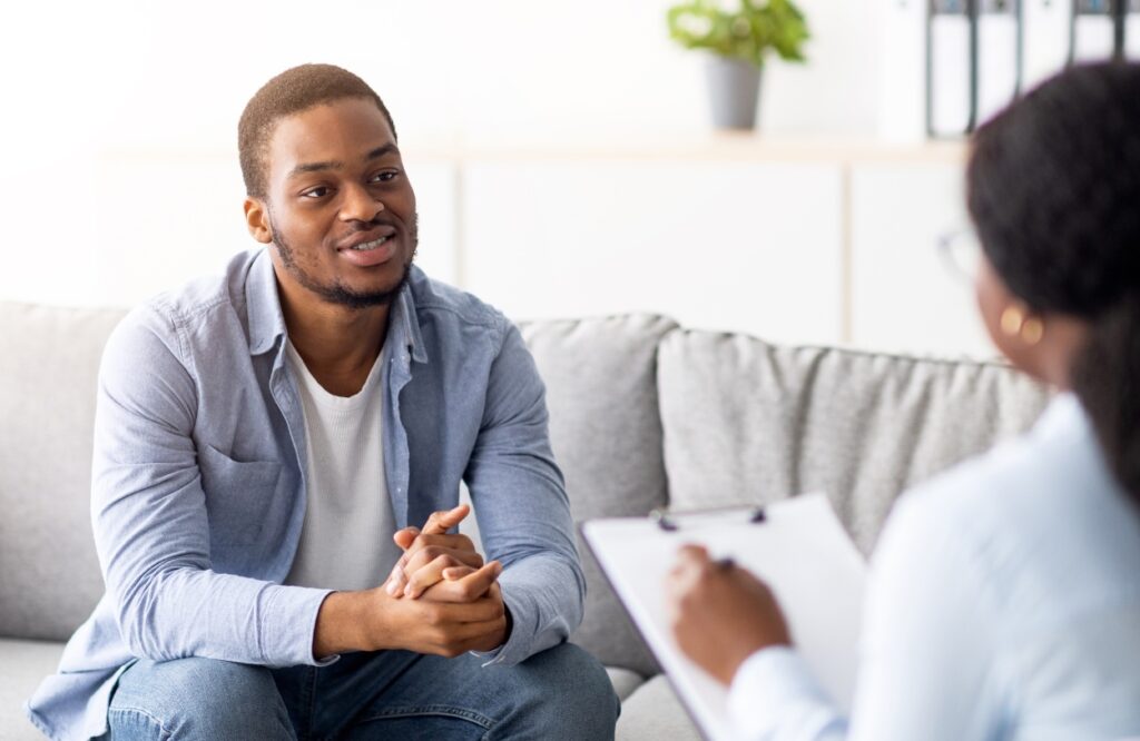 A man enjoys personalized aftercare services after completing schizoaffective disorder treatment in Pompano Beach, FL.