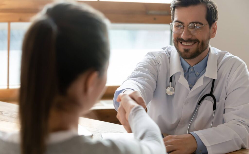 Physician meeting a patient for an appointment about managing sobriety fatigue.