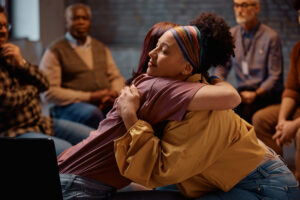 woman being comforted from Ativan Addiction